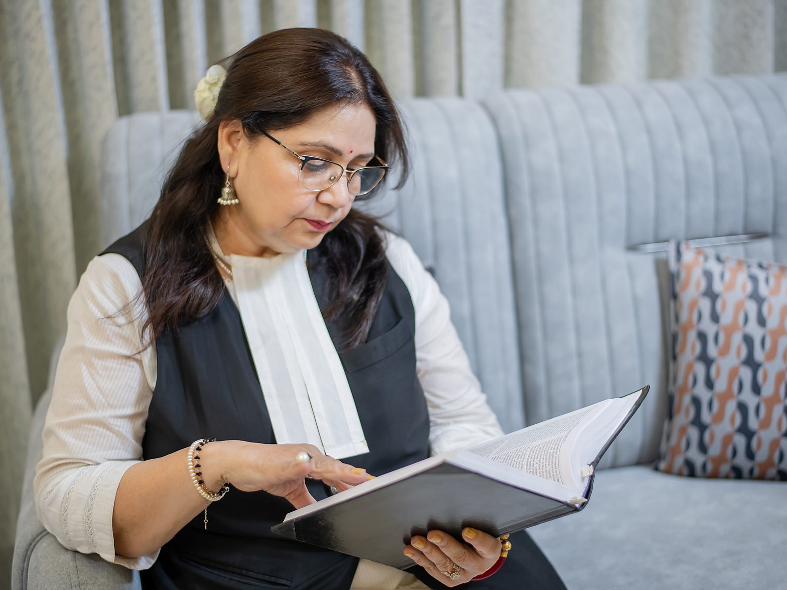 Kiran Ashri reading in her chamber
